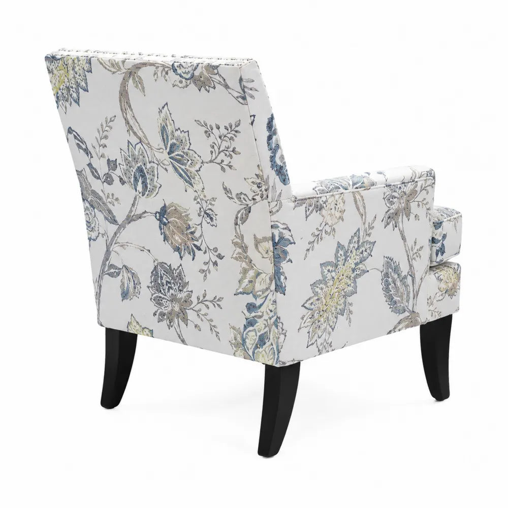 Poltrona in cotone floreale con struttura in legno